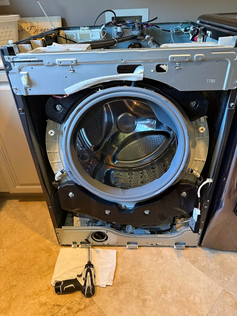 Front-load washer door gasket replacement and leak test by ProStar Appliance Service